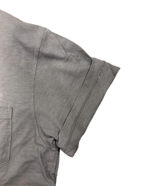 assemble a.k.a. AFFA（アッセンブル エーケーエー エーエフエ）assemble a.k.a. AFFA (アッセンブル エーケーエー エーエフエ) ロゴプリントTシャツ グレー サイズ:Mの古着・服飾アイテム