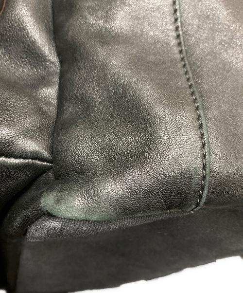 JIMMY CHOO（ジミーチュウ）JIMMY CHOO (ジミーチュウ) レザースタッズバックパック ブラックの古着・服飾アイテム