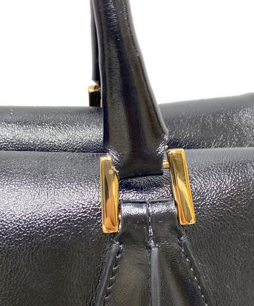 TOD'S（トッズ）TOD'S (トッズ) D-STYLING BAULETTO PICCOLO ハンドバッグ ブラックの古着・服飾アイテム