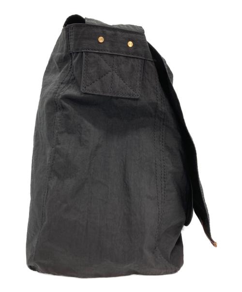 texnh（テクネ）texnh (テクネ) NEWSPAPER WASHER-NY メッセンジャーバッグ ブラックの古着・服飾アイテム