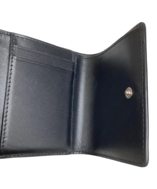 Maison Margiela 11（メゾンマルジェラ 11）Maison Margiela 11 (メゾンマルジェラ 11) ホワイト Four Stitches 財布 ブラックの古着・服飾アイテム