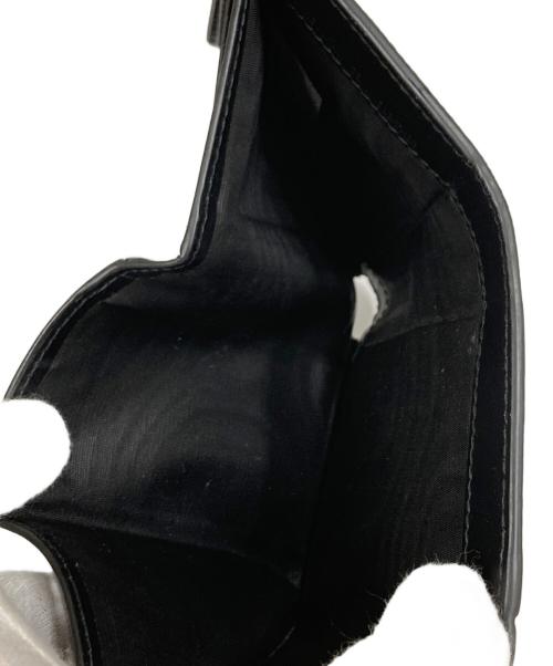 Maison Margiela 11（メゾンマルジェラ 11）Maison Margiela 11 (メゾンマルジェラ 11) ホワイト Four Stitches 財布 ブラックの古着・服飾アイテム