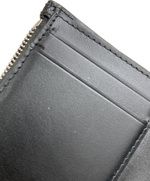 Maison Margiela 11（メゾンマルジェラ 11）Maison Margiela 11 (メゾンマルジェラ 11) ホワイト Four Stitches 財布 ブラックの古着・服飾アイテム
