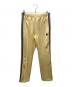Needles（ニードルズ）の古着「トラックパンツ」｜イエロー