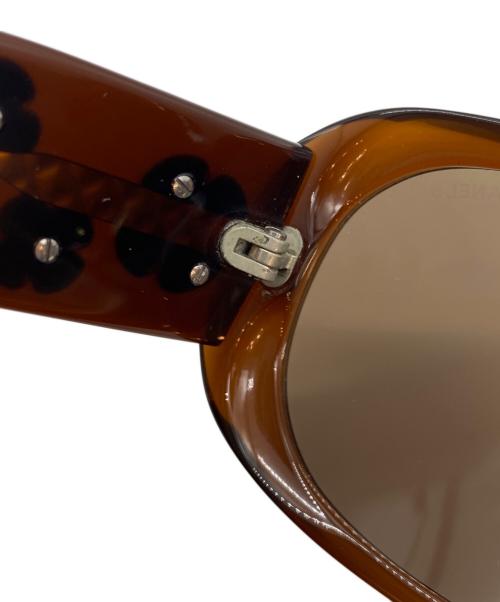CHANEL（シャネル）CHANEL (シャネル) カメリア サングラス ブラウン サイズ:SIZE 56-16-130の古着・服飾アイテム