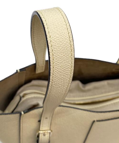 Valextra（ヴァレクストラ）Valextra (ヴァレクストラ) ポーチ付 バケットバッグ マイクロ アイボリーの古着・服飾アイテム