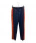 STELLA McCARTNEY（ステラマッカートニー）の古着「サイドライン スラックス」｜ネイビー×レッド