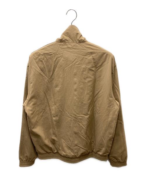 adidas（アディダス）adidas (アディダス) アディカラー ウーブン ファイヤーバード トラックトップ ベージュ×ブラック サイズ:XLの古着・服飾アイテム