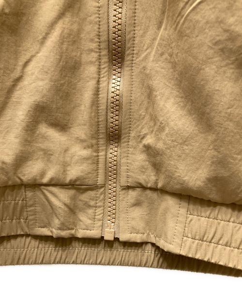 adidas（アディダス）adidas (アディダス) アディカラー ウーブン ファイヤーバード トラックトップ ベージュ×ブラック サイズ:XLの古着・服飾アイテム