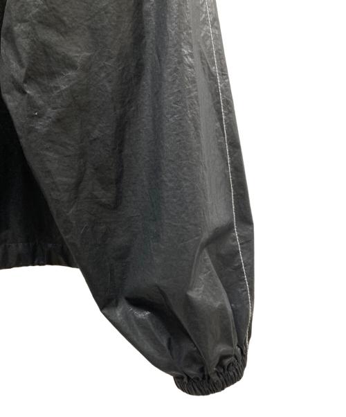 martin kim（マーティンキム）martin kim (マーティンキム) LOGO COATING JKT プリントロゴ　コーティング加工ジャケット ブラック サイズ:Freeの古着・服飾アイテム