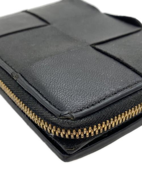 BOTTEGA VENETA（ボッテガベネタ）BOTTEGA VENETA (ボッテガベネタ) スモール カセット ウォレット ブラックの古着・服飾アイテム