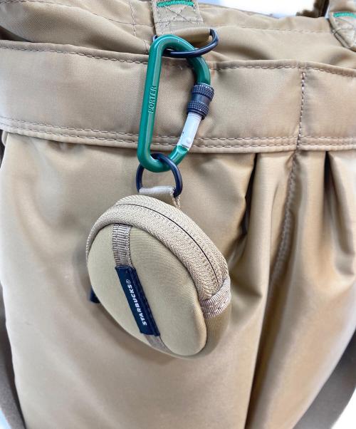 PORTER（ポーター）PORTER (ポーター) STARBUCKS コーヒービーンシェイプ ヘルメットバッグ ベージュの古着・服飾アイテム