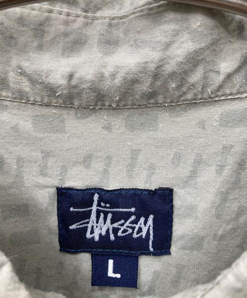 stussy（ステューシー）stussy (ステューシー) シャドーロゴ 半袖シャツ グレー サイズ:SIZE Lの古着・服飾アイテム