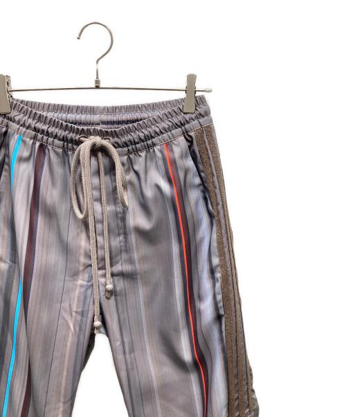 adidas（アディダス）adidas (アディダス) Song for the Mute (ソングフォーザミュート) Allover Print Pants トラックパンツ マルチカラー サイズ:SIZE Sの古着・服飾アイテム