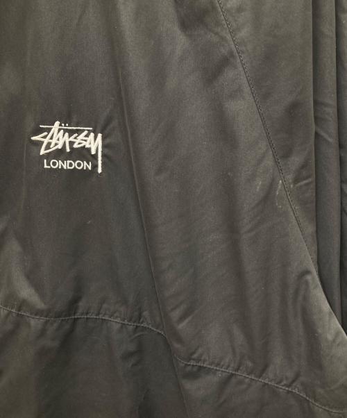 stussy（ステューシー）stussy (ステューシー) コーチジャケット ブラック×イエロー サイズ:Lの古着・服飾アイテム