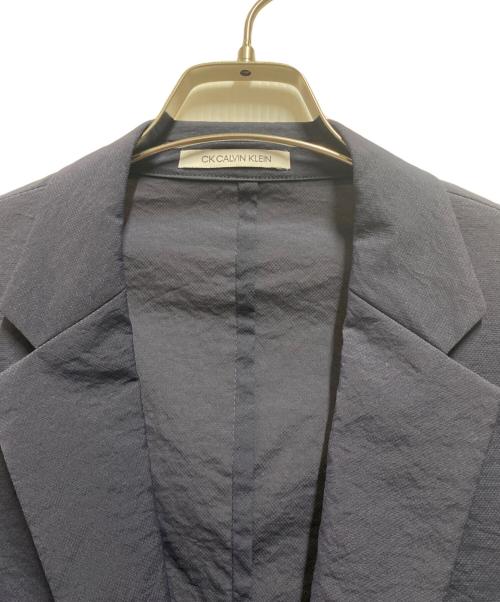 ck Calvin Klein（シーケーカルバンクライン）ck Calvin Klein (シーケーカルバンクライン) ナイロンテーラードジャケット ネイビー サイズ:Ｍの古着・服飾アイテム