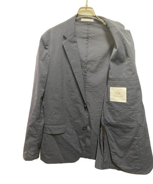ck Calvin Klein（シーケーカルバンクライン）ck Calvin Klein (シーケーカルバンクライン) ナイロンテーラードジャケット ネイビー サイズ:Ｍの古着・服飾アイテム