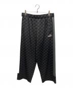 PUMAプーマ）の古着「CORE HERITAGE モノグラム トラック パンツ」｜ブラック
