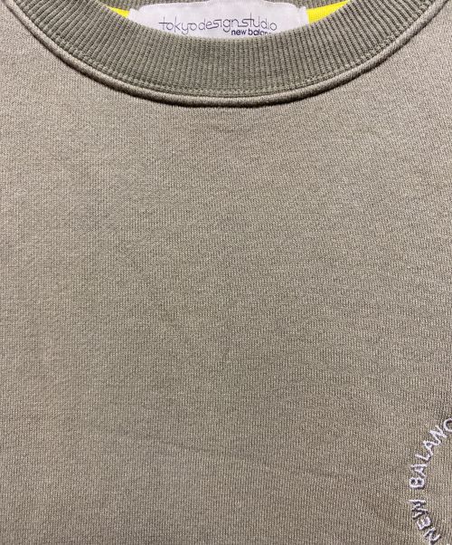 NEW BALANCE（ニューバランス）NEW BALANCE (ニューバランス) tokyo design studio (トーキョーデザインスタジオ) フレンチテリー ショートスリーブ クルーネック オリーブ サイズ:3の古着・服飾アイテム