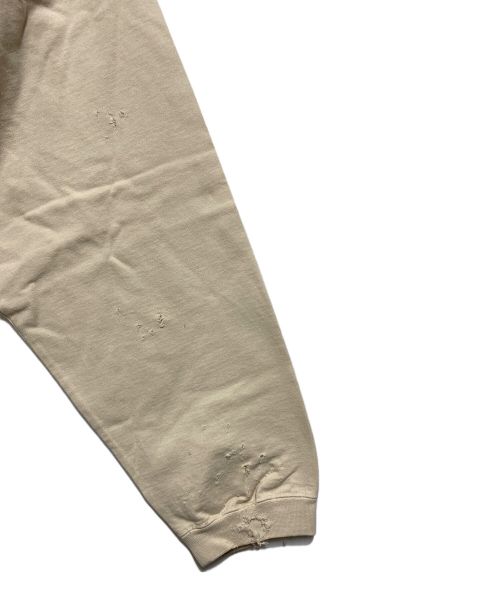 ISAMU KATAYAMA BACKLASH（イサムカタヤマ･バックラッシュ）ISAMU KATAYAMA BACKLASH (イサムカタヤマ・バックラッシュ) Resurrection (レザレクション) コットン天竺製品染めダメージ加工ロングスリーブ ベージュ サイズ:Sの古着・服飾アイテム