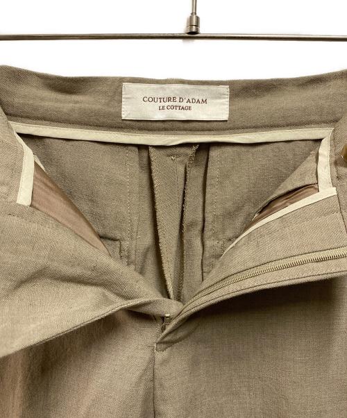 Couture d'adam（クチュールドアダム）Couture d'adam (クチュールドアダム) スリットテーパードパンツ ベージュ サイズ:FREEの古着・服飾アイテム