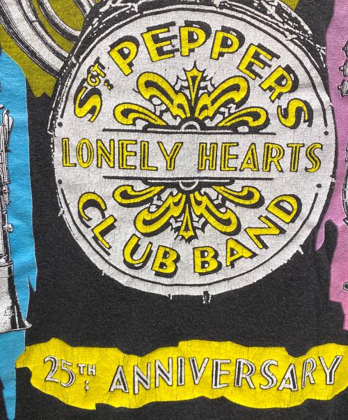 Hanes（ヘインズ）Hanes (ヘインズ) Sgt.Pepper's Lonely Hearts Club Band 25TH ANNIVERSARY Tシャツ ブラック サイズ:Ⅼの古着・服飾アイテム