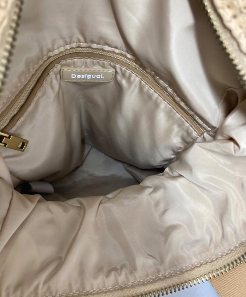 Desigual（デシグアル）Desigual (デシグアル) ミディアムラフィアVoyagerバックパック ベージュの古着・服飾アイテム
