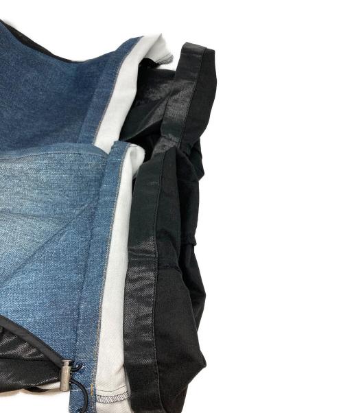 ANDERSSON BELL（アンダーソンベル）ANDERSSON BELL (アンダーソンベル) TROMPE L`OEIL LAYERED TYING PANTS インディゴ サイズ:34 未使用品の古着・服飾アイテム