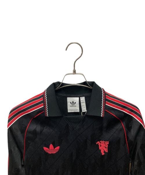 adidas（アディダス）adidas (アディダス) マンチェスター・ユナイテッド LIFESTYLER LSジャージー ブラック サイズ:Ｓ 未使用品の古着・服飾アイテム