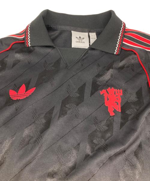 adidas（アディダス）adidas (アディダス) マンチェスター・ユナイテッド LIFESTYLER LSジャージー ブラック サイズ:Ｓ 未使用品の古着・服飾アイテム