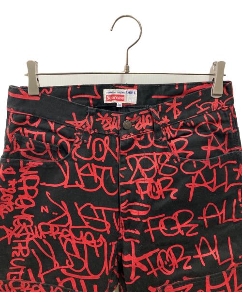 SUPREME（シュプリーム）SUPREME (シュプリーム) COMME des GARCONS SHIRT (コムデギャルソンシャツ) CANVAS PAINTER PANTS ブラック×レッド サイズ:30の古着・服飾アイテム