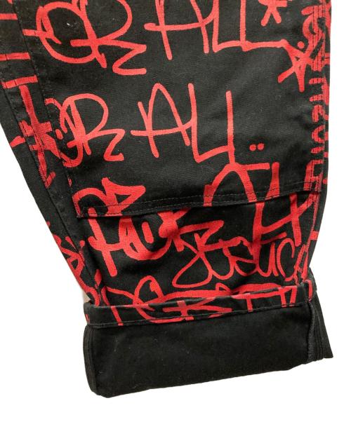 SUPREME（シュプリーム）SUPREME (シュプリーム) COMME des GARCONS SHIRT (コムデギャルソンシャツ) CANVAS PAINTER PANTS ブラック×レッド サイズ:30の古着・服飾アイテム