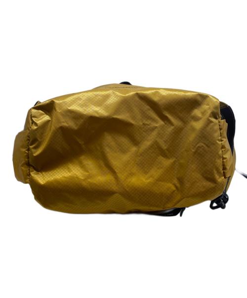 and wander（アンドワンダー）and wander (アンドワンダー) sil daypack ベージュの古着・服飾アイテム