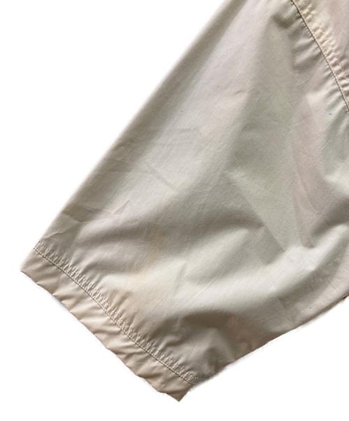 OAKLEY（オークリー）OAKLEY (オークリー) 90-00's S/S メタルロゴシャツ ベージュ サイズ:Mの古着・服飾アイテム