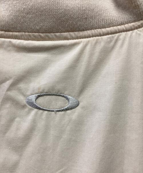OAKLEY（オークリー）OAKLEY (オークリー) 90-00's S/S メタルロゴシャツ ベージュ サイズ:Mの古着・服飾アイテム