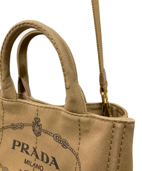 PRADA（プラダ）PRADA (プラダ) 2WAYキャンバストートバッグ ベージュの古着・服飾アイテム