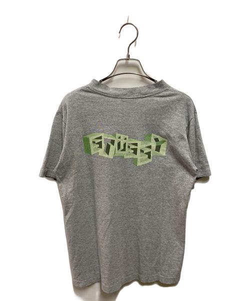 stussy（ステューシー）stussy (ステューシー) ブロックロゴプリントTシャツ グレー サイズ:Sの古着・服飾アイテム