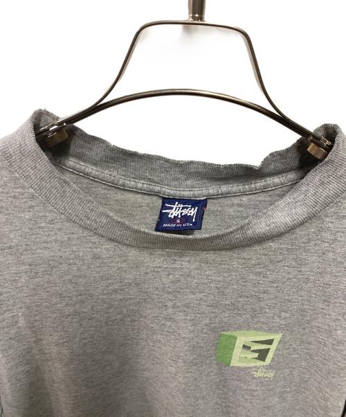 stussy（ステューシー）stussy (ステューシー) ブロックロゴプリントTシャツ グレー サイズ:Sの古着・服飾アイテム