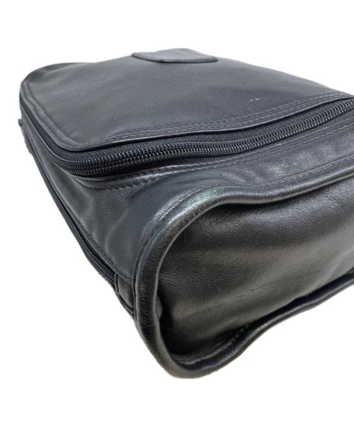 TUMI（トゥミ）TUMI (トゥミ) レザークラッチバッグ ブラックの古着・服飾アイテム
