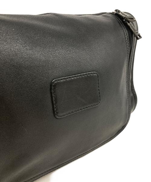 TUMI（トゥミ）TUMI (トゥミ) レザークラッチバッグ ブラックの古着・服飾アイテム