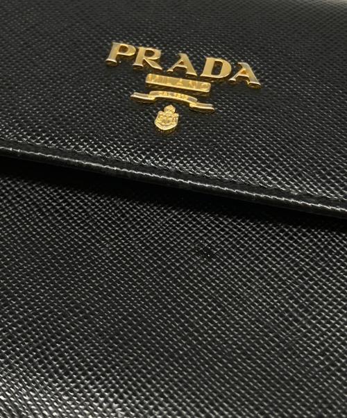 PRADA（プラダ）PRADA (プラダ) サフィアーノ コンパクトウォレット ブラックの古着・服飾アイテム
