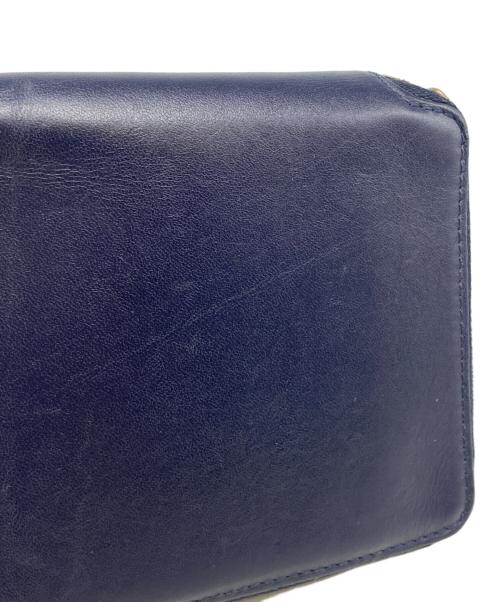 COMME des GARCONS（コムデギャルソン）COMME des GARCONS (コムデギャルソン) ラウンドジップ2つ折り財布 ネイビーの古着・服飾アイテム