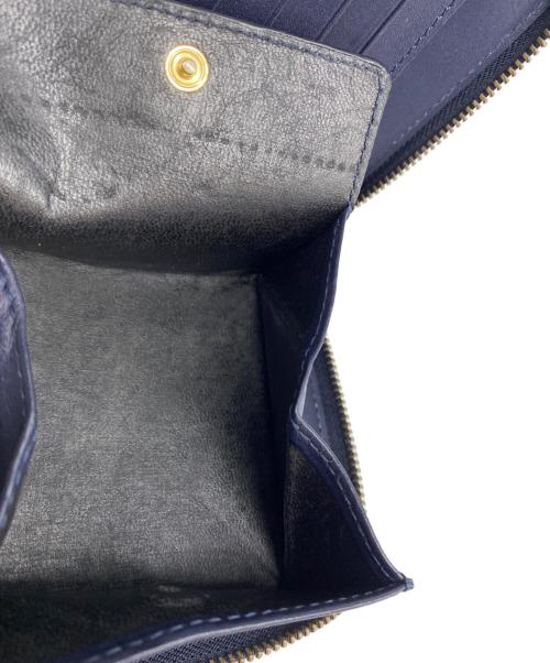 COMME des GARCONS（コムデギャルソン）COMME des GARCONS (コムデギャルソン) ラウンドジップ2つ折り財布 ネイビーの古着・服飾アイテム