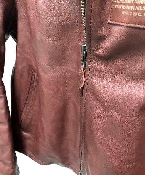 AVIREX（アヴィレックス）AVIREX (アヴィレックス) AGED WAPPEN STAND ZIP RIDERS レッド サイズ:Mの古着・服飾アイテム