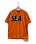 WIND AND SEA（ウィンダンシー）の古着「Tシャツ」｜オレンジ