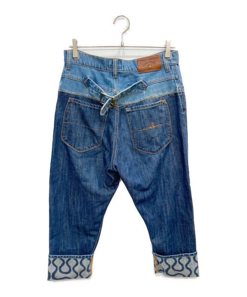Vivienne Westwood ANGLOMANIA（ヴィヴィアンウエストウッドアングロマニア）VIVIENNE WESTWOOD ANGLOMANIA (ヴィヴィアンウエストウッドアングロマニア) スクイグル柄ロールアップデニムパンツ インディゴ サイズ:W28の古着・服飾アイテム