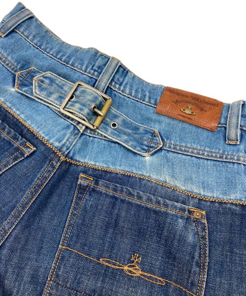 Vivienne Westwood ANGLOMANIA（ヴィヴィアンウエストウッドアングロマニア）VIVIENNE WESTWOOD ANGLOMANIA (ヴィヴィアンウエストウッドアングロマニア) スクイグル柄ロールアップデニムパンツ インディゴ サイズ:W28の古着・服飾アイテム