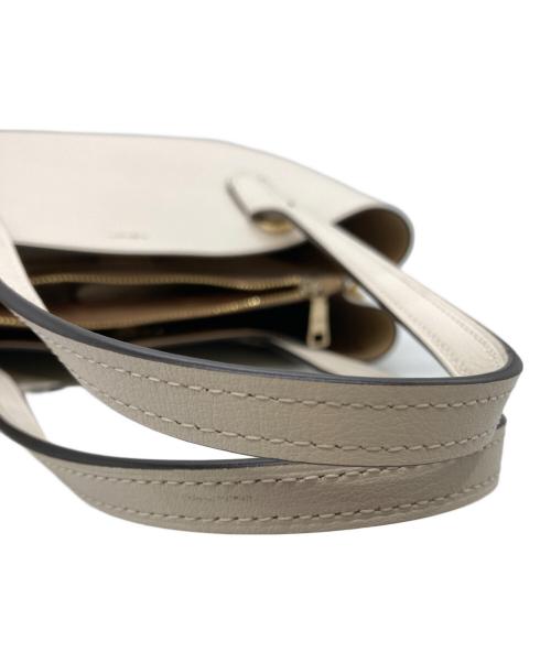 COACH（コーチ）COACH (コーチ) ミニアベニュー キャリーオール2WAYバッグ アイボリーの古着・服飾アイテム