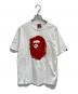 A BATHING APE（ア ベイシング エイプ）の古着「30周年記念ロゴプリントTシャツ」｜ホワイト×レッド