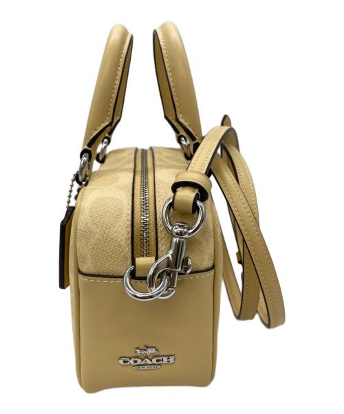 COACH（コーチ）COACH (コーチ) PEANUTS (ピーナッツ) サッチェル クロスボディ バッグ イエローの古着・服飾アイテム